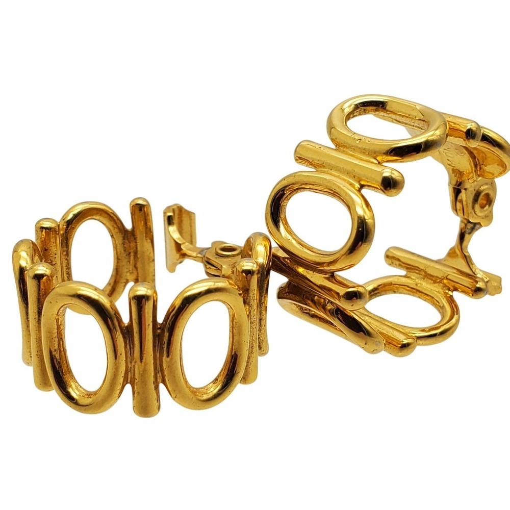 Monet Clip On Hoop Earrings Gold Tone Geometric Openwork Retro Designer Jewelry